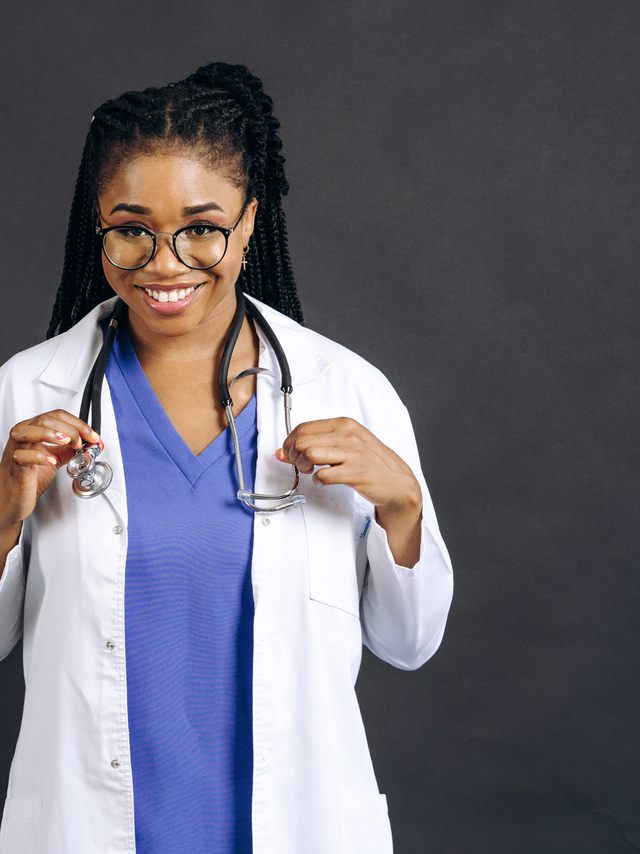 A physician in a white coat with a stethoscope